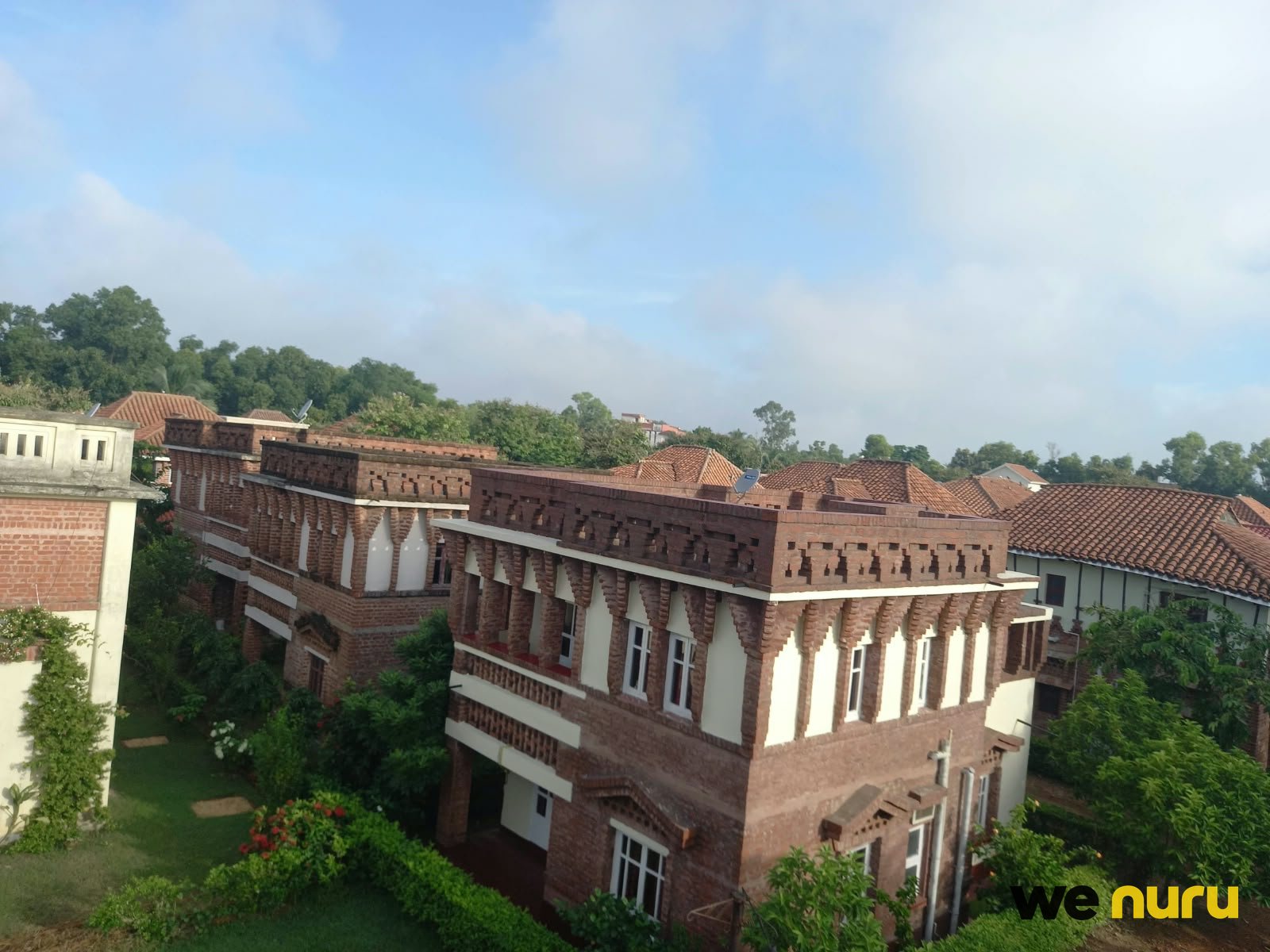 Lush Green Garden Farmhouse with Charming Brick Architecture — farmhouse in Gopalnagar